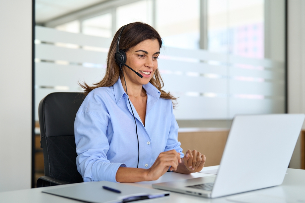 Busy,Middle,Aged,Female,Support,Service,Operator,Talking,To,Customer